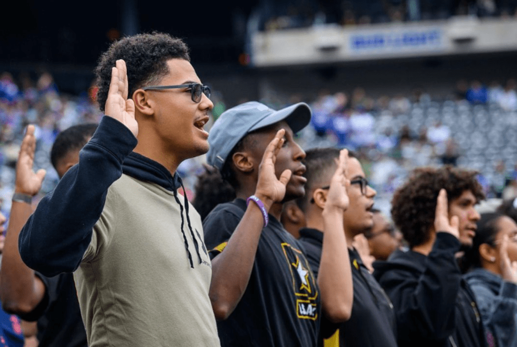 a group of people taking an oath